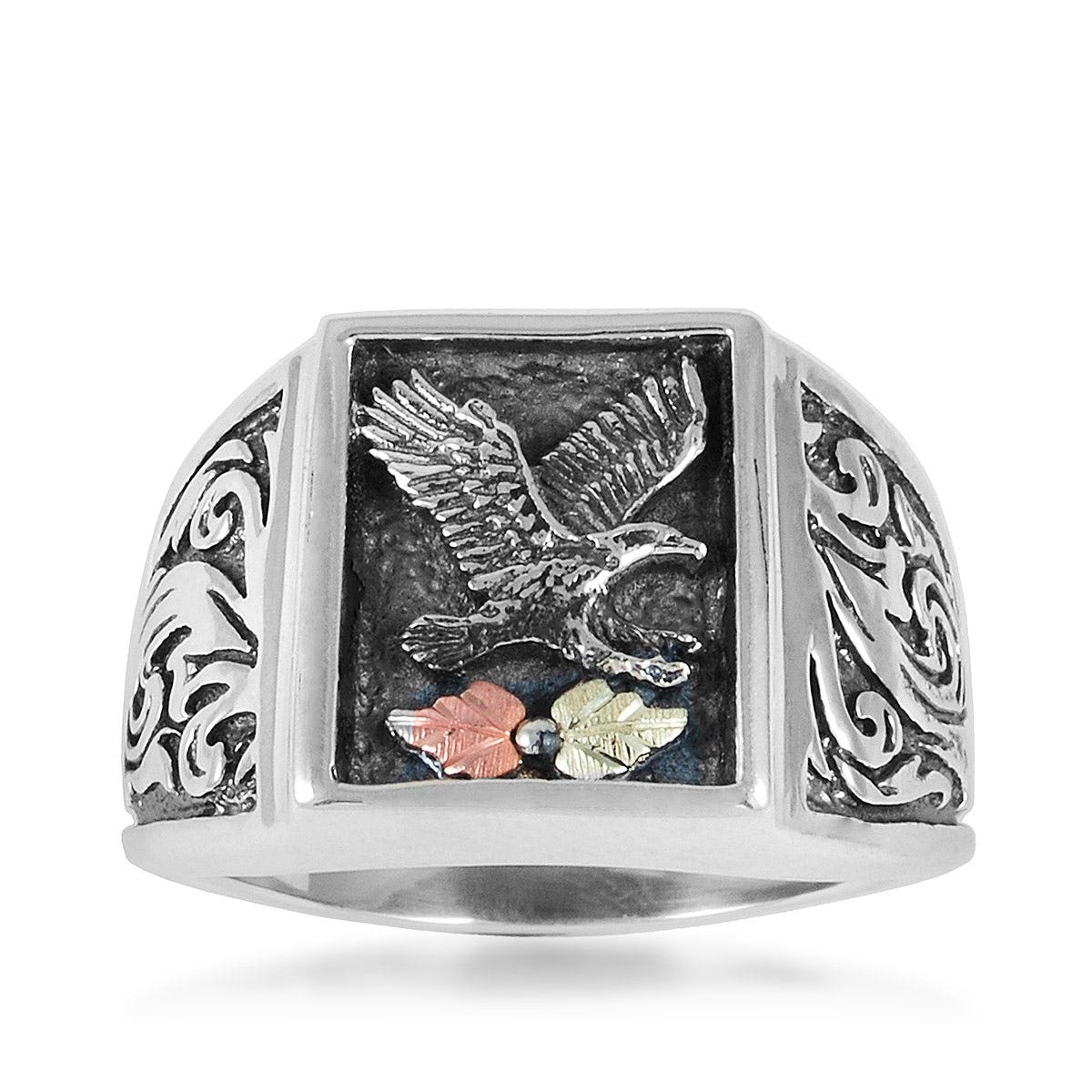 sterling silver eagle ring with oxidized finish and pink and green gold leaves