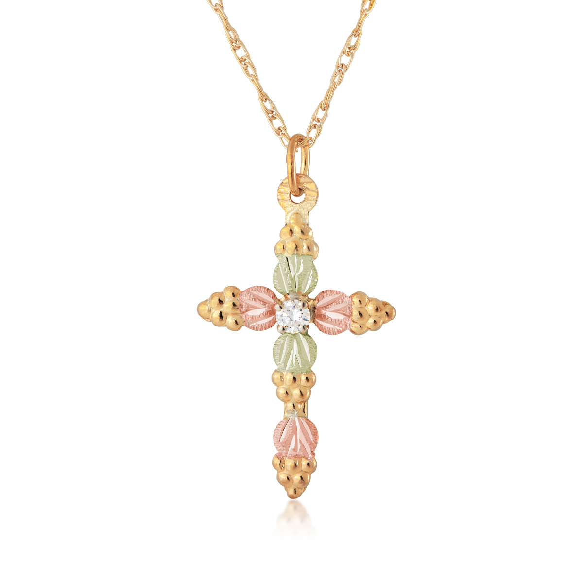 10K yellow gold Black Hills Gold diamond accent leaf and grape cluster cross pendant