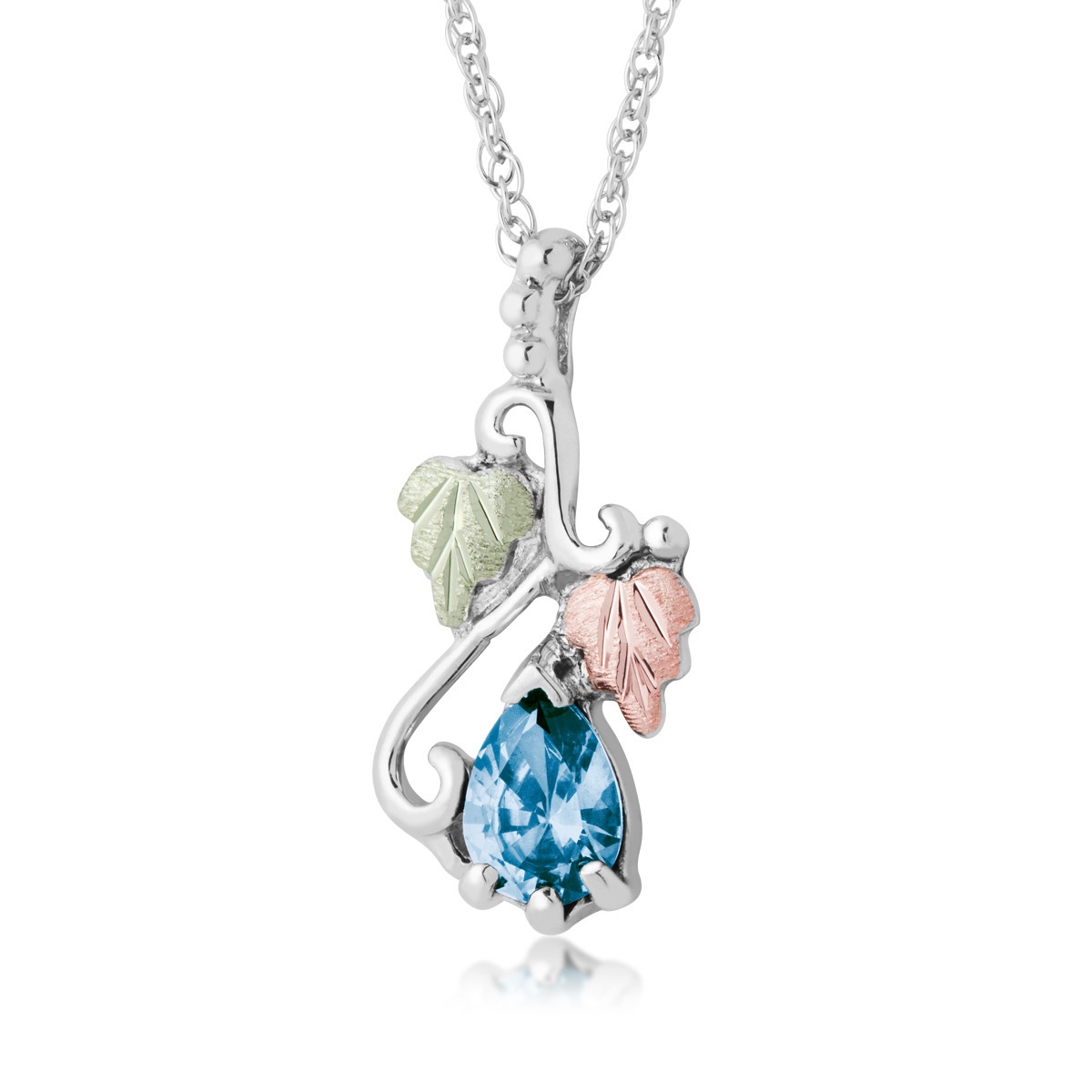 Landstrom's Black Hills Gold Synthetic Pear Blue Topaz Vine & Leaf Drop Pendant in Sterling Silver
