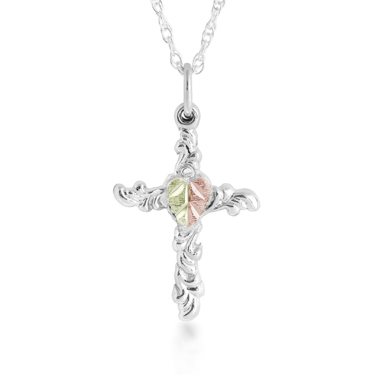 Sterling silver Black Hills Gold cross with centered pink and green gold heart