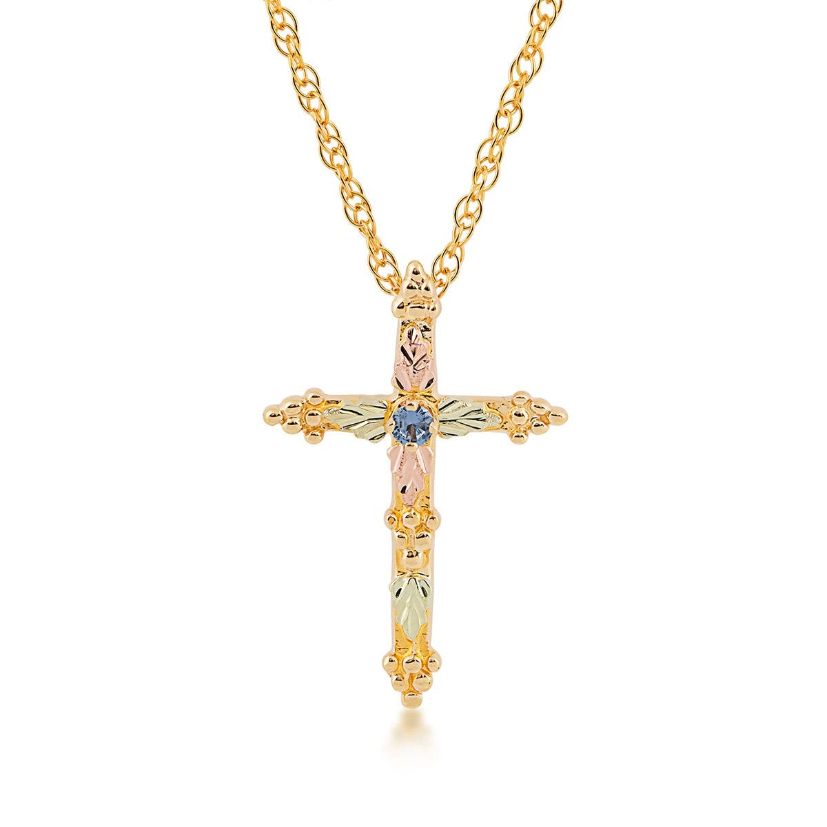 Black Hills Gold Yogo sapphire cross pendant with leaves and grapes